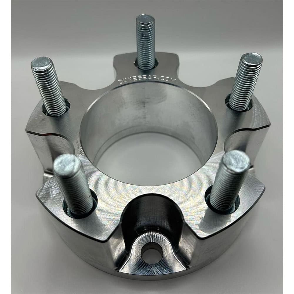 A high-quality, machined aluminum dune wheel hub with five sturdy bolts for off-road vehicle customization.