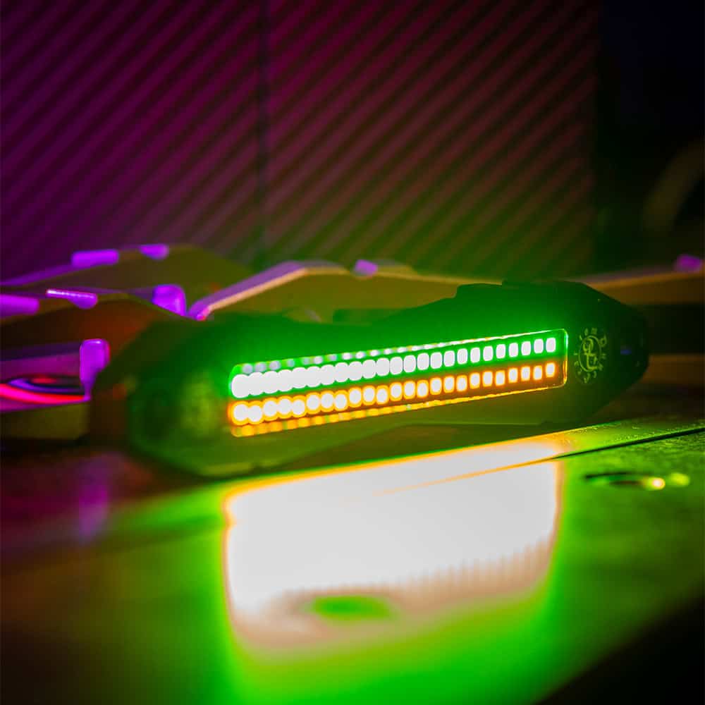 Bright LED snowboard chase lights with vibrant colors for night snowboarding adventures.